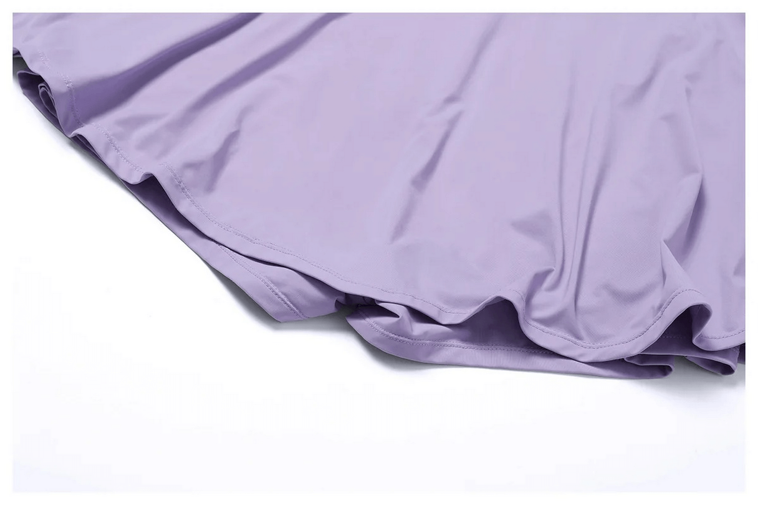 Close-up of a stylish purple flared sports skirt for women, made from nylon and spandex, perfect for active outings.